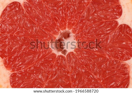 Texture of fresh ripe grapefruit. Closeup macro of grapefruit pulp. High resolution photo. Full depth of field.
