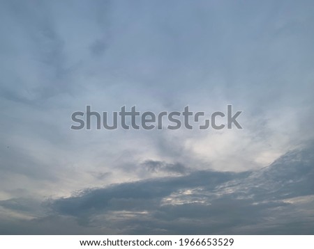 Altostratus Cloud in the evening is covered with a wide area. The cloud base looks gray and pastel turquoise at Bangkok, Thailand. no focus