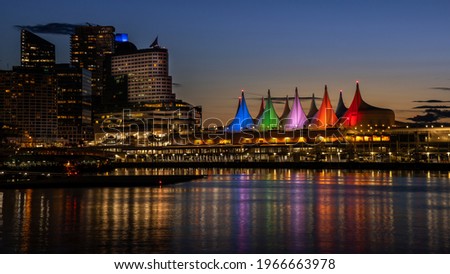 Blue Hour after the Sun has set over the Harbor and the Colorful Sails of Canada Place, the Cruise Ship Terminal and Convention Center on the Waterfront of Vancouver, British Columbia, Canada