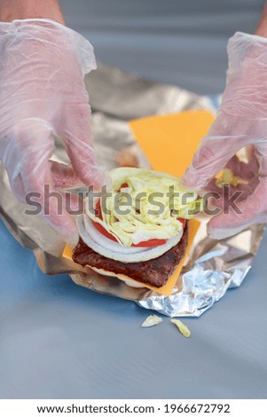 Food preparation hamburger on a bun