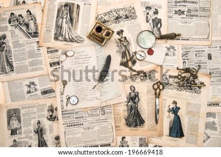 antique office accessories, writing tools, vintage fashion magazine for the woman from 1898. retro style toned picture