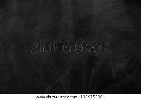 Texture of chalk on black chalkboard or blank blackboard background. School education, dark wall backdrop, template for learning board concept.