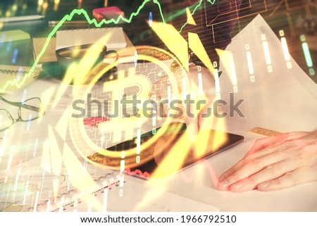 Double exposure of man's hands holding and using a phone and crypto currency blockchain theme drawing.