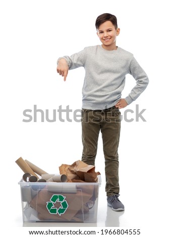 recycling, waste sorting and sustainability concept - smiling boy with paper garbage in plastic box over white background