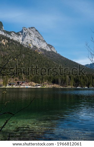 summer day at a green alpine lake in the bavarian mountains located in the national park berchtesgarden