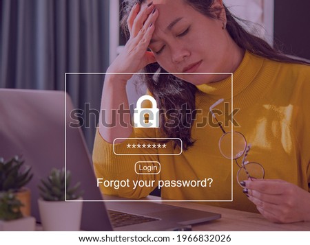 Abstract background design an Overworked Asian businesswoman suffering from headache and thinking sitting tired in front of laptop because Forgot password to get access into her personal laptop.