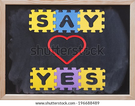 Say Yes message written with puzzle pieces