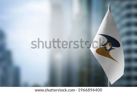 Patch of the national flag of the Eurasian Economic Union on a white t-shirt Royalty-Free Stock Photo #1966896400