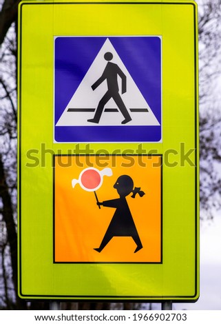 road sign pedestrian crossing especially frequented by children D-6 and T-27