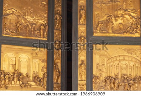 Opened Golden Gates of Paradise with Bible Icons on main door of Duomo Baptistry in Florence
