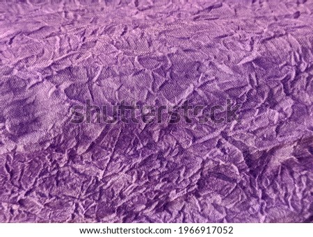 The creased pattern fabric in purple tone