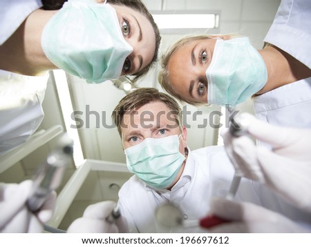 Dentist and nurses from low angle view