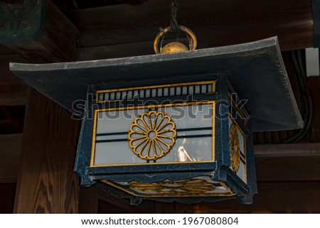 Details of the Meji Shrine in Tokyo. Ancient lamp in the hall of Meiji shrine