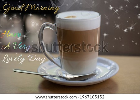 a glass of cappuccino on the table with blurred background. Glass, ceramic white hot drinks. Cup of coffee in coffee shop blurry. Good Morning Quotes With Images and Good Morning Messages. Espresso
