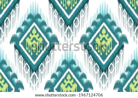 Ikat ethnic Indian seamless pattern design. Aztec fabric carpet mandala ornament native boho African American textile decoration wallpaper. Geometric chevron texture vector illustrations background.