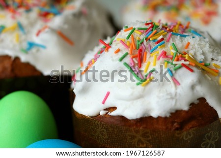 Easter cakes (Orthodox Easter cakes), eggs. The scene of the Easter holiday. Festive composition on a white table. copy space
