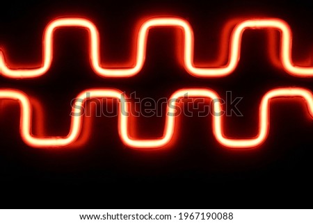 Superposition of meander waves on oscilloscope screen glowing in darkness. Abstract science and technology background. Luminous energy flow. Electronics, modern medical equipment, physics, mathematics