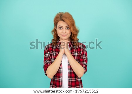 pretty look of young smiling girl. red haired woman. happy redhead woman casual style. express positive emotions. dreamy lady with curly hair. beauty and fashion. female model in checkered shirt.