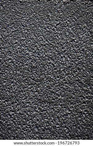 Asphalt grainy surface of road