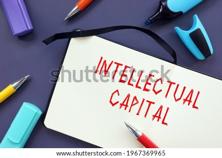 Business concept meaning Intellectual Capital with sign on the page. 
