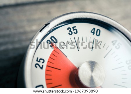 30 Minutes - Macro Of An Analog Timer On A Wooden Floor Royalty-Free Stock Photo #1967393890
