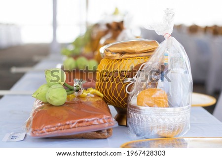 Closeup image of equipment for offering the newly ordained monks, in the Buddhist ordination ceremony. Royalty-Free Stock Photo #1967428303