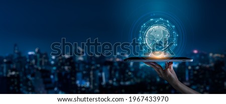 Modern city with wireless network connection and city scape concept.Wireless network and Connection technology concept with city background at night. Royalty-Free Stock Photo #1967433970
