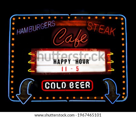 Vintage Neon Cafe Sign on Small Town Restaurant