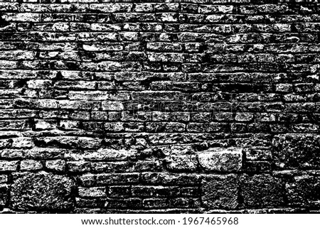 Old grungy retro grimy brick wall of ancient city. Uneven dirty pitted peeled surface brickwork of cellar worn. Ruined solid bumpy stiff blocks. Hard messy ragged holes brickwall for 3D grunge design