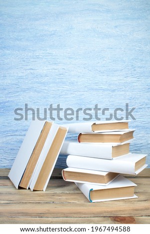 open book, books on the blue background. Back to school. Education. Copy space for text