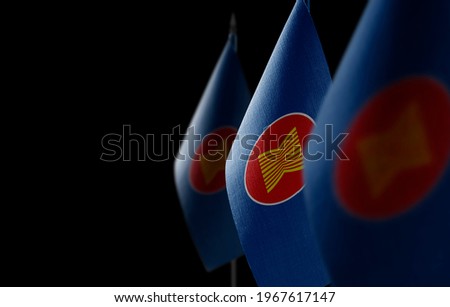 Small national flags of the ASEAN on a black background Royalty-Free Stock Photo #1967617147
