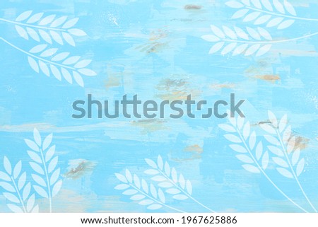 top view of blue wooden background with wheat crops. Symbols of jewish holiday - Shavuot