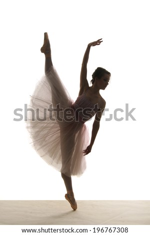 silhouette of ballerina in tutu on white background