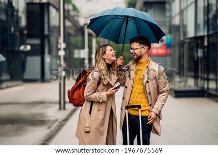 a young couple, visiting, in the city, enjoying time together