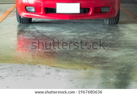Bangkok, Thailand - 02 May 2021 : Front of Bumper car and Cement floor in the Parking lot. Copy space, Selective focus.