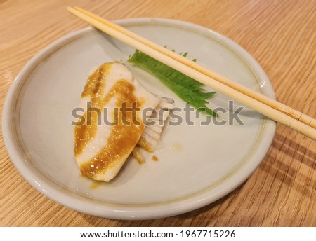 Grilled halibut fish with sauce, Japanese sauce