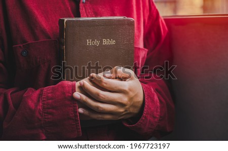 Woman prayer hug bible, worship and pray. concept for faith, old bible