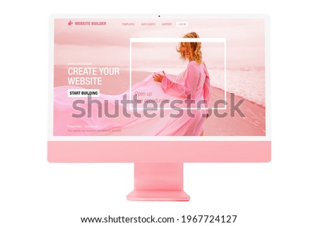 Sample website on modern pink colored desktop computer