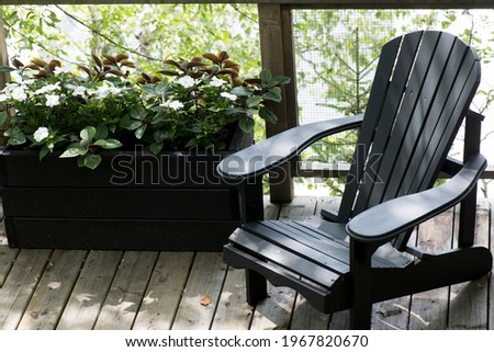 Adirondack chair on a deck, Kenora, Lake of the Woods, Ontario, Canada