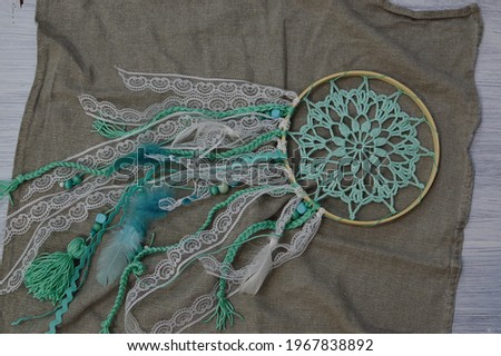 Mint in dream catcher color on natural linen fabric, hand made. Boho decor.