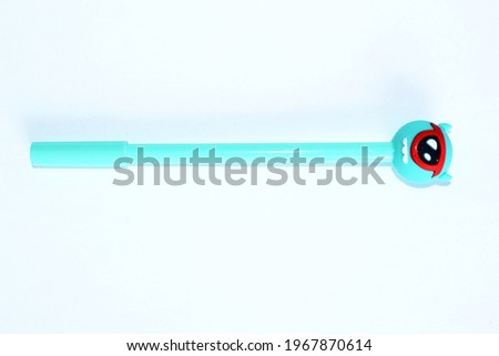 blue ballpoint pen on white background