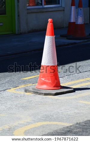 a traffic cone on the road