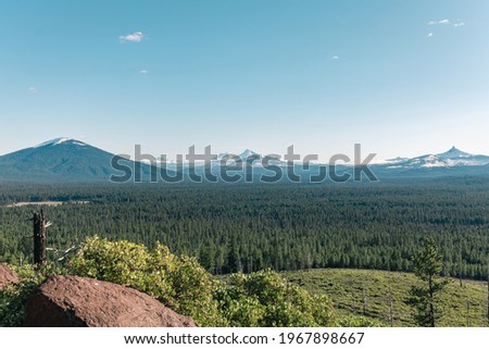 Black Butte, The Three Sisters, and Mount Washington in the Oregon Cascades