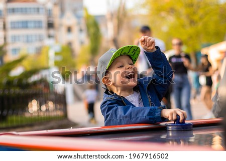 happy emotions of a little boy while playing