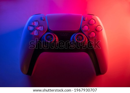 Next Gen game controller with blue and red lights - Selective Focus