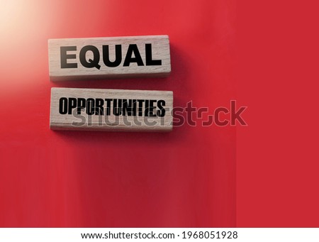 Equal Opportunities words on wooden blocks. Equality concept.