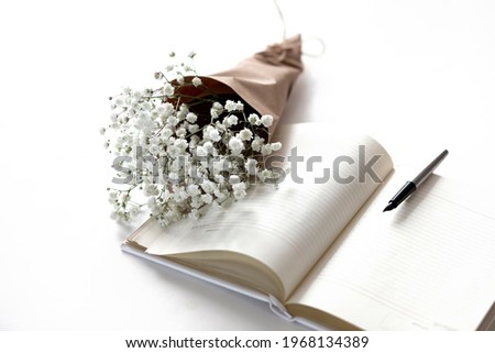 Mockup on a white isolated background with gentle flowers and plants. Cute feminine image.
