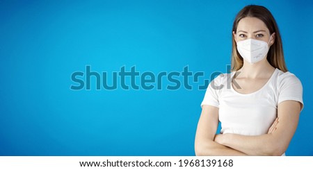 Woman with a fpp2 mask against infection and viruses such as flu, corona virus, covid-19, sars or swine influenca                    Royalty-Free Stock Photo #1968139168