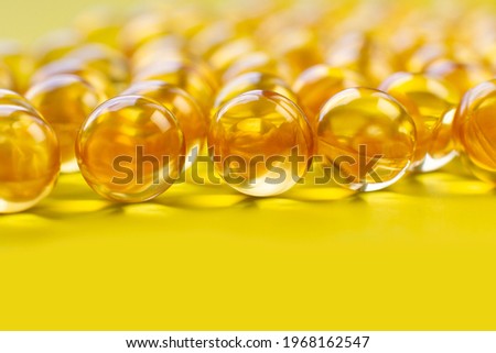 Fish oil capsules isolated on white background. Medical pills