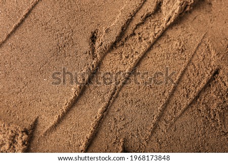 Texture of henna powder as background
